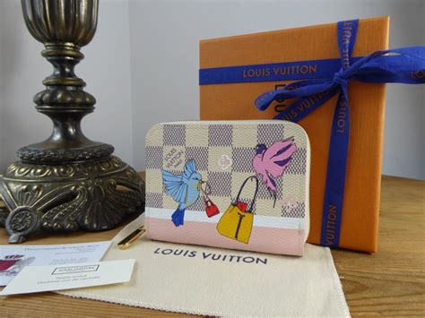 louis vuitton yellow bird purse|authentic Louis Vuitton coin purse.